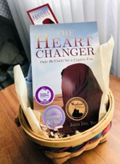 The award-winning book The Heart Changer in a basket on a table. 